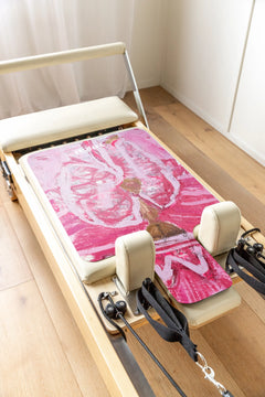 Becoming You Reformer Pilates Mat by Pav Spencer and yogat – eco-friendly and PVC-free, featuring non-slip microfiber with original Australian artwork. Fits most reformer machines; lightweight and machine washable.