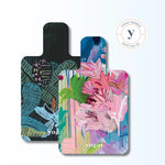 Two yogat eco-friendly non-slip reformer Pilates mats side by side, designed with Australian artist prints – the perfect sustainable gift for shared movement.
