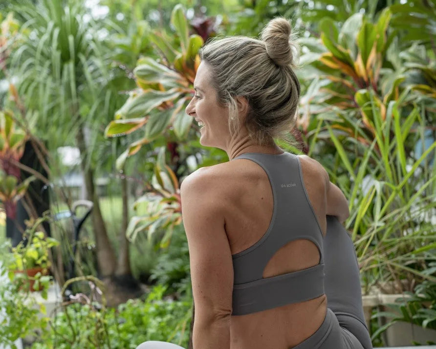 Artistic display of yogat eco-friendly yoga bundles featuring Australian-designed mats and wellness accessories, promoting sustainable self-care.